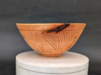 Hand-carved wet-turned maple bowl