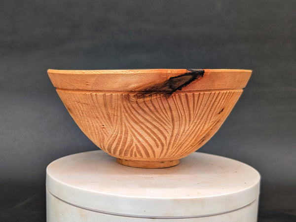 Hand-carved wet-turned maple bowl