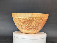 Hand-carved wet-turned maple bowl